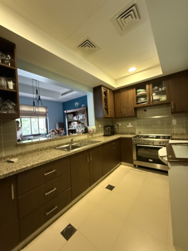 Traditional kitchen with updated cabinets as a renovation alternative in Dubai